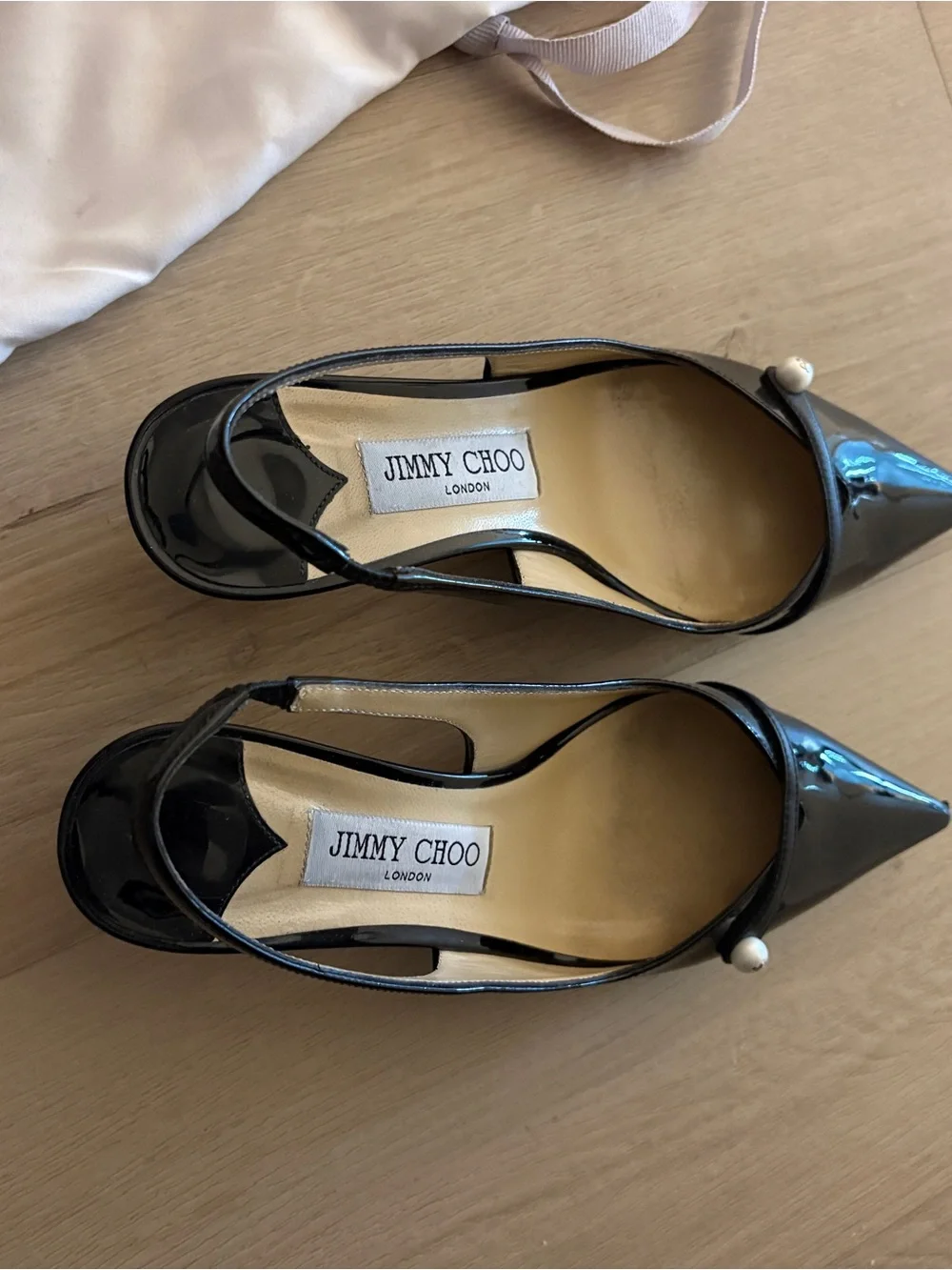 Jimmy Choo Black Patent Leather Pointed Slingback Pumps with Pearl Accent